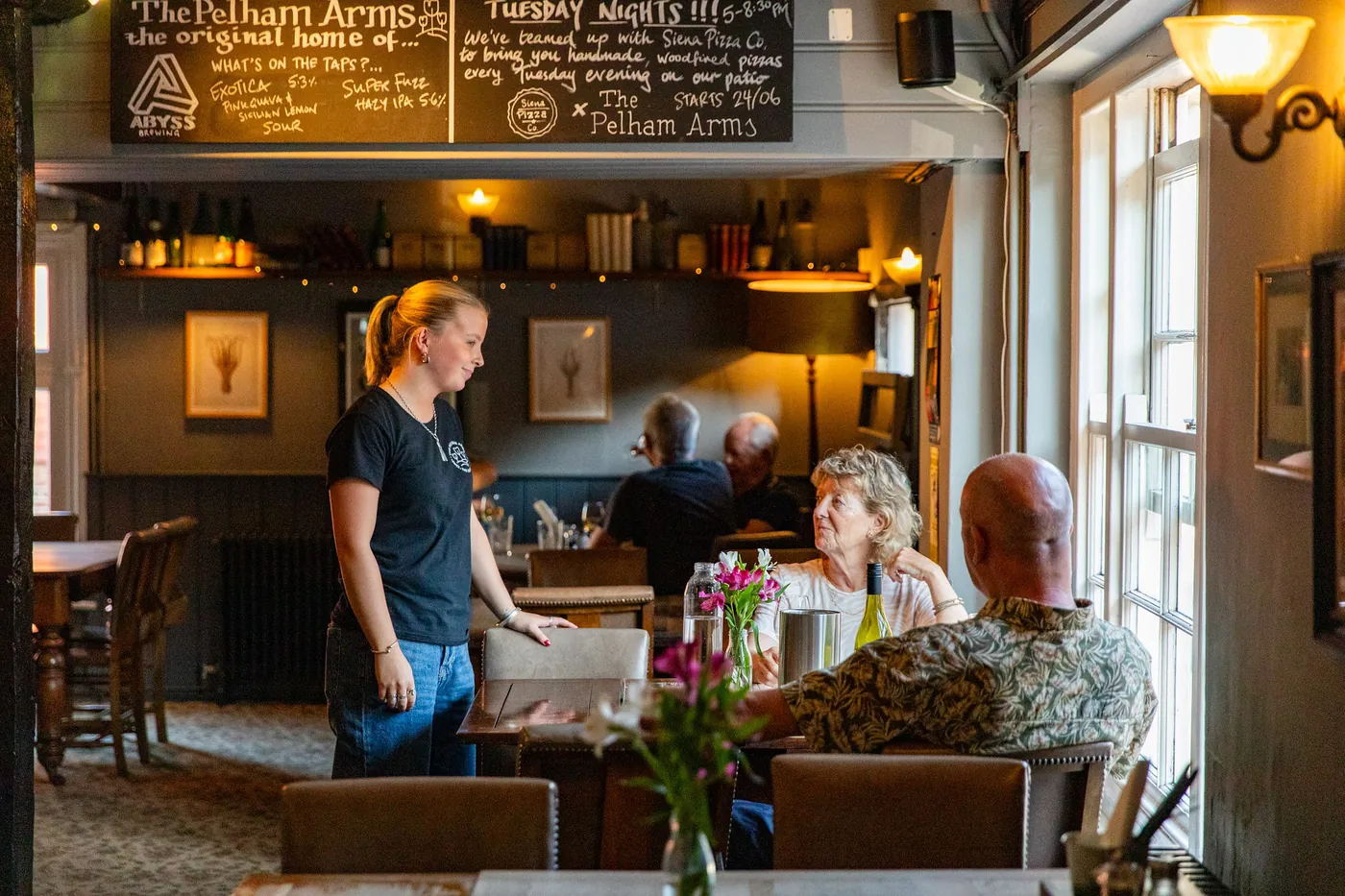 Guests and staff at The Pelham Arms